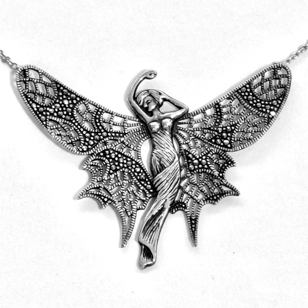 Sterling Silver & Marcasite Fairy about 16” long.